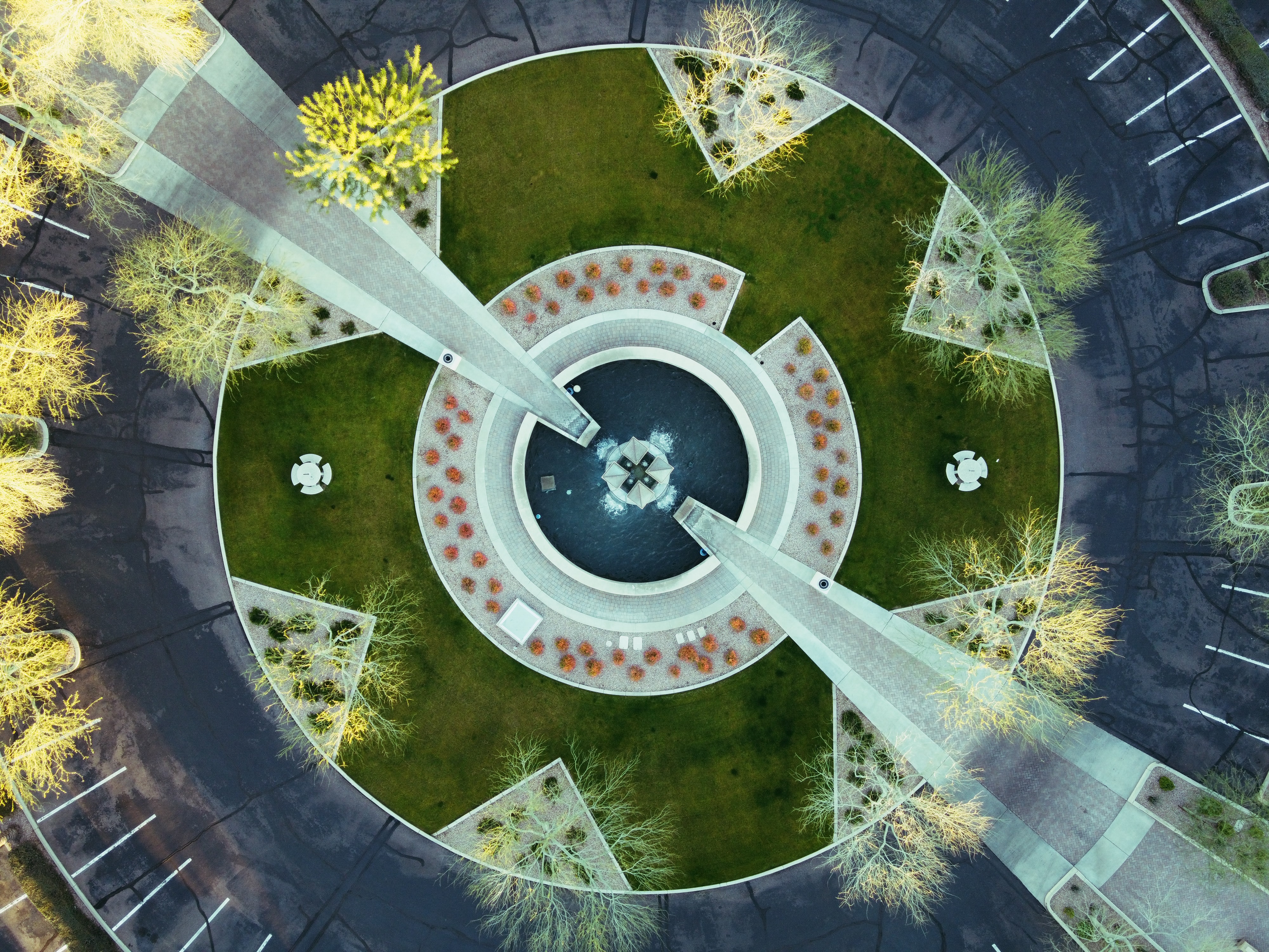 Aerial photo of a circular park surrounded by pavement